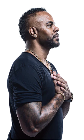 Sean Clayton, hands over heart, eyes open, side profile