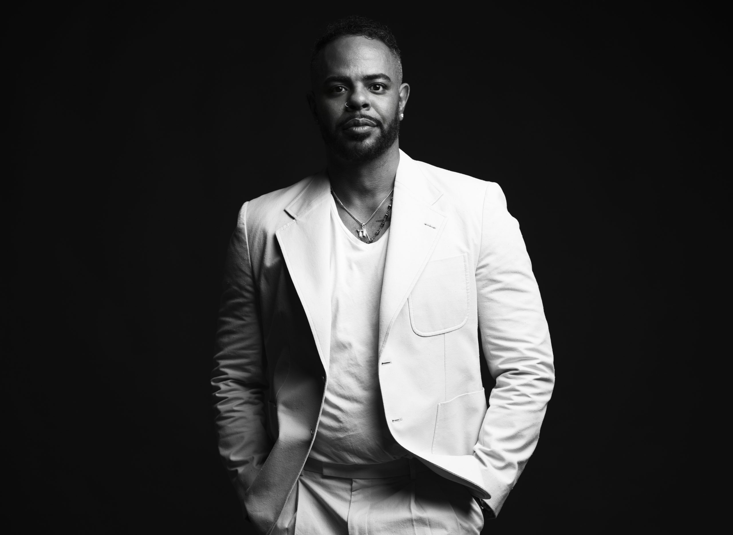 Sean Clayton portrait in a white suit